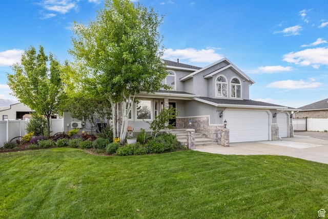 13226 S Cocomo Ct W, Herriman, UT 84096 - view of front facade with stucco siding, concrete driveway, an attached garage, and stone siding