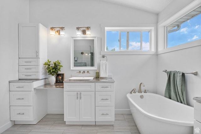 13226 S Cocomo Ct W, Herriman, UT 84096 - full bath featuring vanity, a soaking tub, plenty of natural light, a shower, and lofted ceiling