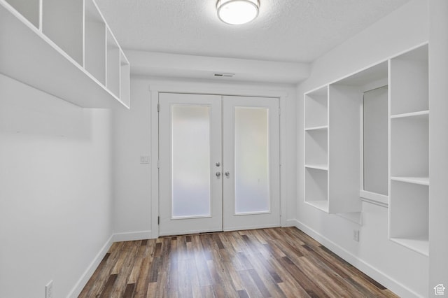 13226 S Cocomo Ct W, Herriman, UT 84096 - mudroom with french doors, dark wood finished floors, a textured ceiling, and baseboards