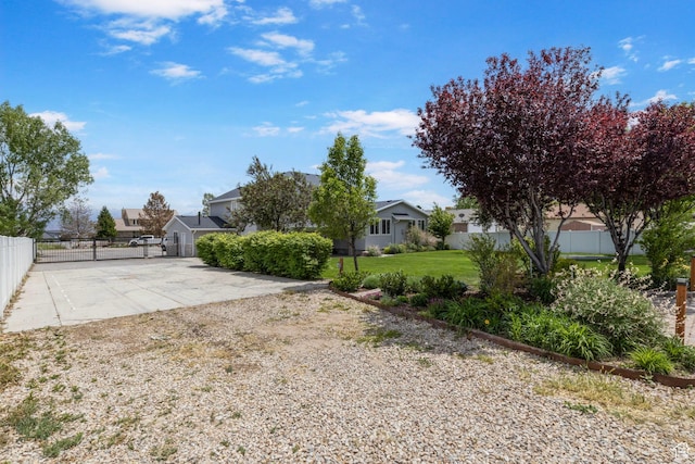 13226 S Cocomo Ct W, Herriman, UT 84096 - view of yard featuring a residential view and concrete driveway