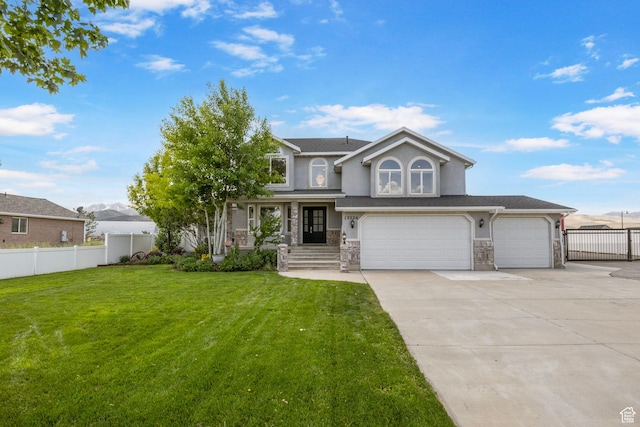 13226 S Cocomo Ct W, Herriman, UT 84096 - view of front facade with concrete driveway, an attached garage, stone siding, and stucco siding