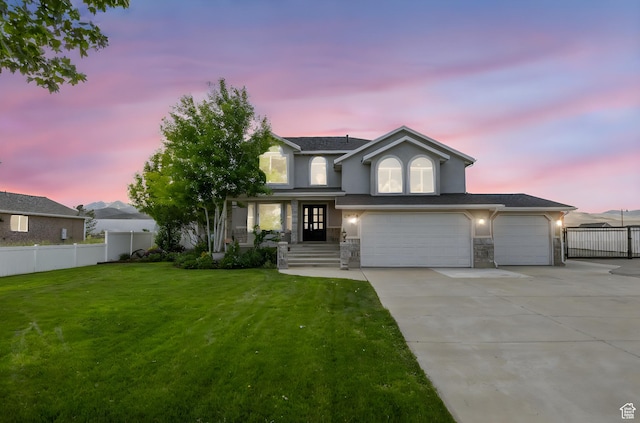 13226 S Cocomo Ct W, Herriman, UT 84096 - view of front facade featuring concrete driveway, stucco siding, stone siding, and a garage