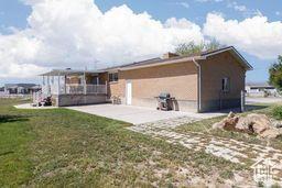 330 N 100 E, Centerfield, UT 84622 - back of property featuring a patio and a yard