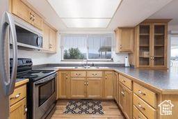 330 N 100 E, Centerfield, UT 84622 - kitchen featuring stainless steel appliances, plenty of natural light, and light brown cabinetry
