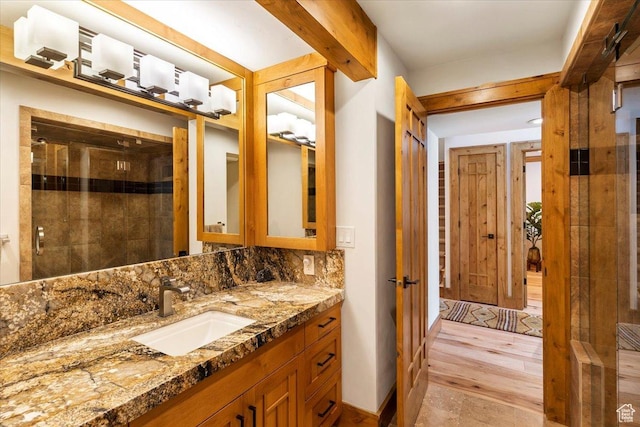 1825 S 1666th Dr E, Bountiful, UT 84010 - full bath with vanity, decorative backsplash, a tile shower, and wood finished floors