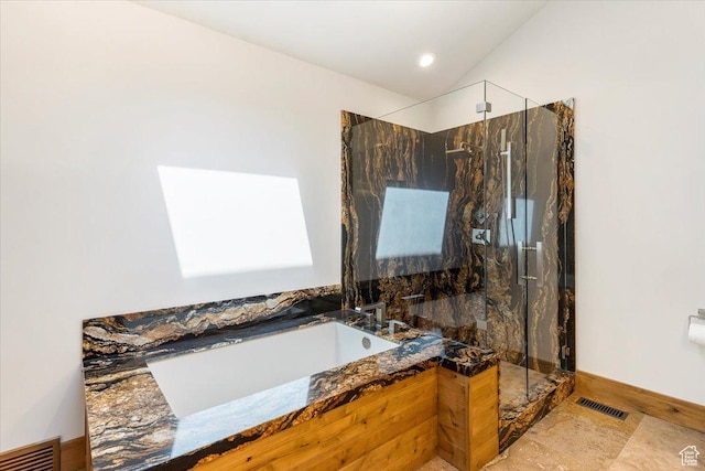 1825 S 1666th Dr E, Bountiful, UT 84010 - full bathroom with a marble finish shower, a bath, lofted ceiling, and baseboards