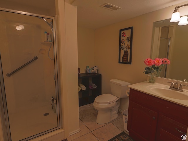 113 N 4950 W, West Point, UT 84015 - bathroom with vanity, a shower stall, toilet, and tile patterned floors
