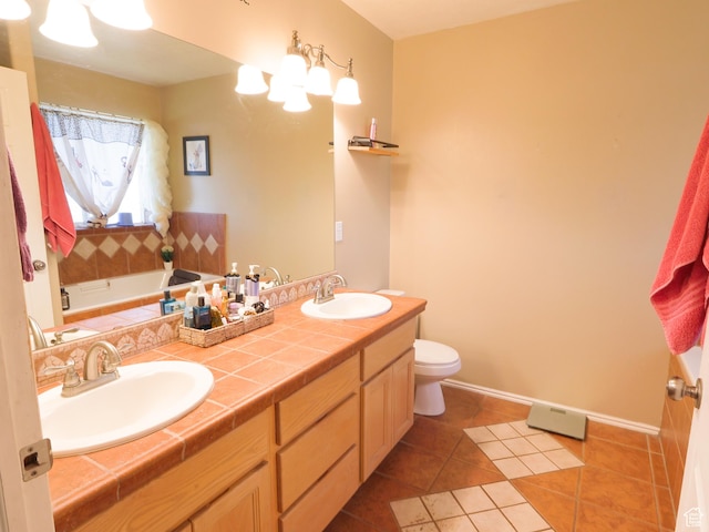 113 N 4950 W, West Point, UT 84015 - bathroom featuring toilet, tile patterned floors, double vanity, a bathtub, and baseboards