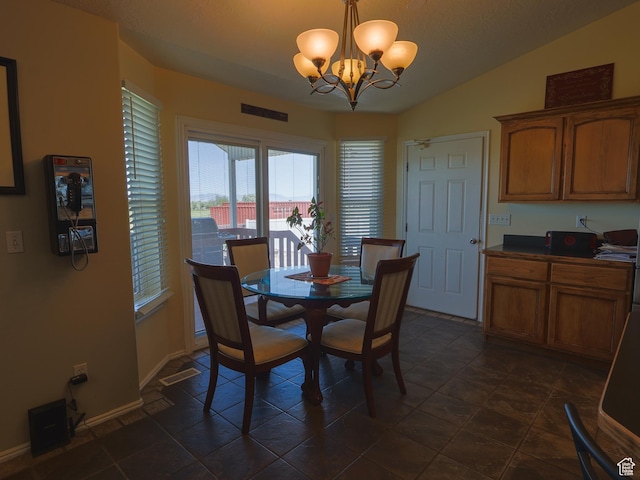 113 N 4950 W, West Point, UT 84015 - dining area with a chandelier, baseboards, and lofted ceiling