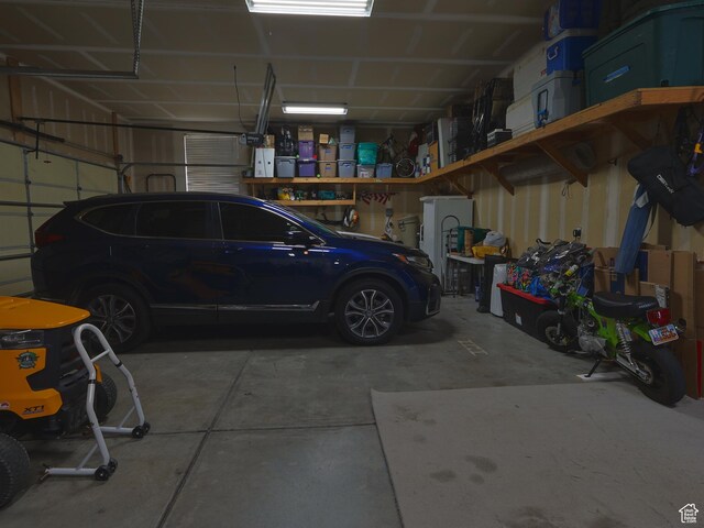 113 N 4950 W, West Point, UT 84015 - garage featuring a garage door opener