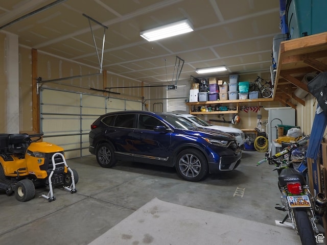 113 N 4950 W, West Point, UT 84015 - garage featuring a garage door opener