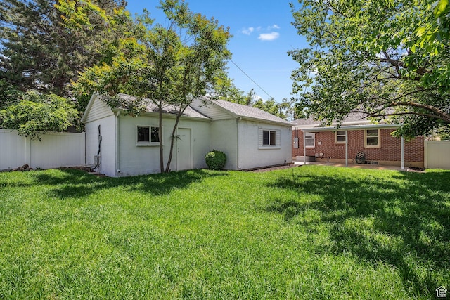 1861 E Ramona Ave, Salt Lake City, UT 84108 - rear view of house with a patio area and brick siding