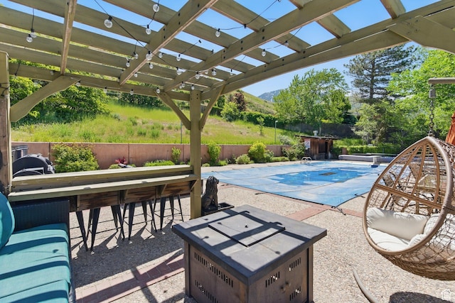 12 N Quiet Meadow Ln, Mapleton, UT 84664 - view of pool with a mountain view, a pergola, a patio area, and a fire pit