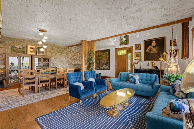 12 N Quiet Meadow Ln, Mapleton, UT 84664 - living room featuring hardwood / wood-style floors and a textured ceiling
