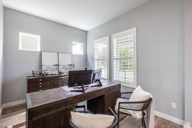 5067 W Beach Comber Way S, South Jordan, UT 84009 - home office with baseboards and light wood-style flooring