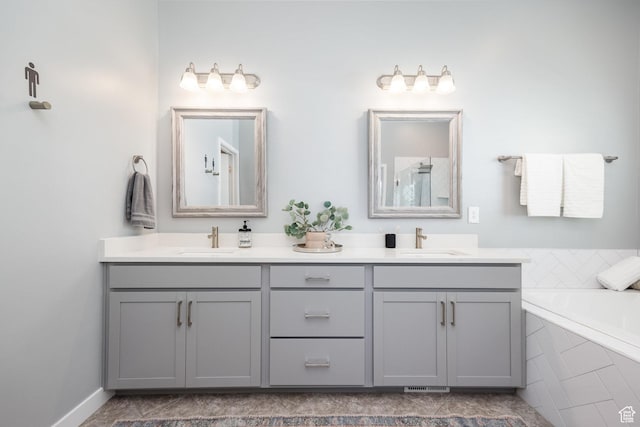 5067 W Beach Comber Way S, South Jordan, UT 84009 - full bathroom featuring double vanity and tiled tub