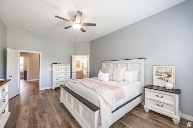 5067 W Beach Comber Way S, South Jordan, UT 84009 - bedroom featuring dark wood-type flooring, baseboards, and ensuite bathroom