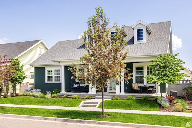 5067 W Beach Comber Way S, South Jordan, UT 84009 - view of front of property with a shingled roof, covered porch, and cooling unit
