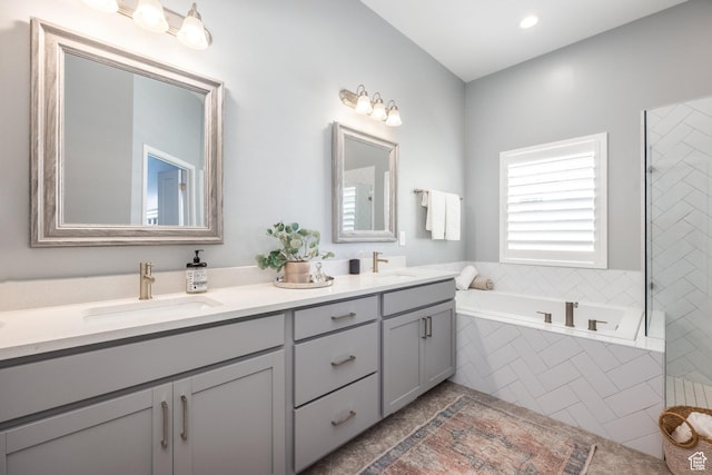 5067 W Beach Comber Way S, South Jordan, UT 84009 - full bath with double vanity, a bath, and tile patterned floors