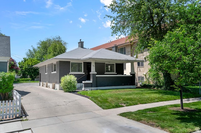 341 N 300 W, Provo, UT 84601 - view of front of house featuring a chimney and brick siding