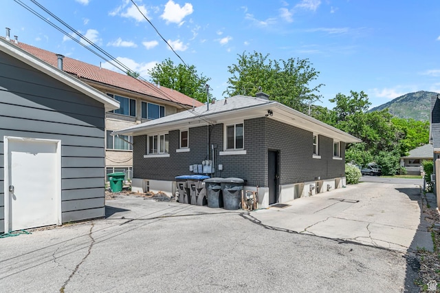 341 N 300 W, Provo, UT 84601 - rear view of house with brick siding and a mountain view
