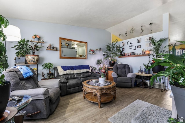 276 W 700 N, Tooele, UT 84074 - living room with wood finished floors and vaulted ceiling