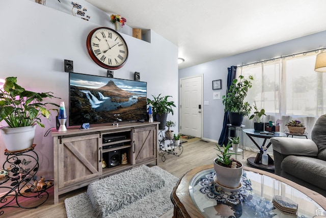 276 W 700 N, Tooele, UT 84074 - living room with light wood-type flooring and baseboards