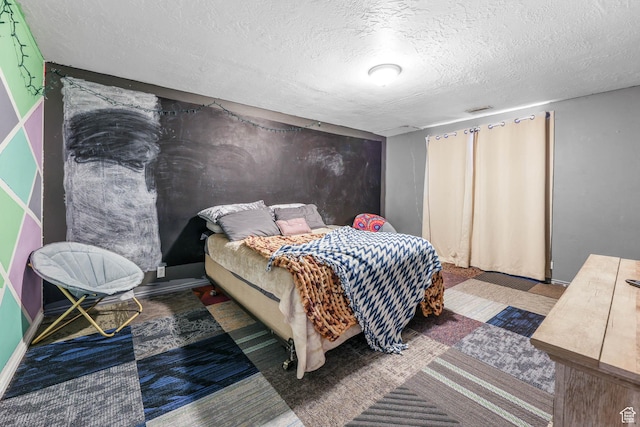 276 W 700 N, Tooele, UT 84074 - bedroom with a textured ceiling and baseboards