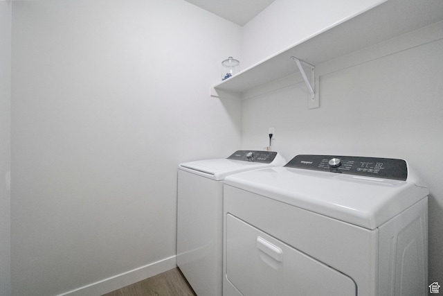 15002 S Wild Horse Way, Bluffdale, UT 84065 - laundry area featuring independent washer and dryer, wood finished floors, and baseboards