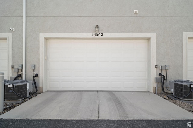 15002 S Wild Horse Way, Bluffdale, UT 84065 - garage featuring central AC and driveway