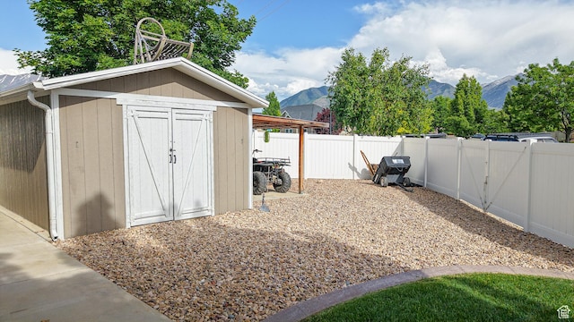 918 S River Ridge Lane, Spanish Fork, UT 84660 - view of shed featuring a fenced backyard and a mountain view