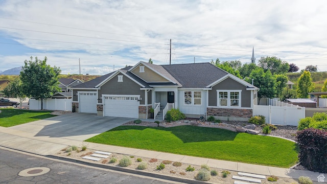 918 S River Ridge Lane, Spanish Fork, UT 84660 - craftsman house featuring a garage, concrete driveway, and stone siding