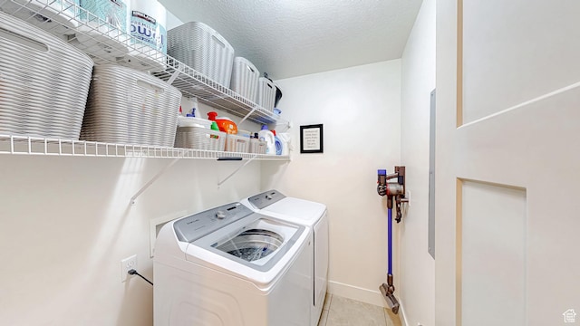 918 S River Ridge Lane, Spanish Fork, UT 84660 - washroom with independent washer and dryer, tile patterned flooring, and baseboards