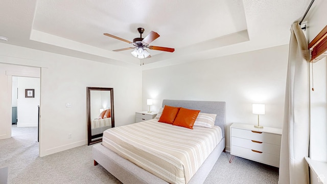 918 S River Ridge Lane, Spanish Fork, UT 84660 - bedroom featuring a tray ceiling, carpet floors, baseboards, and a ceiling fan