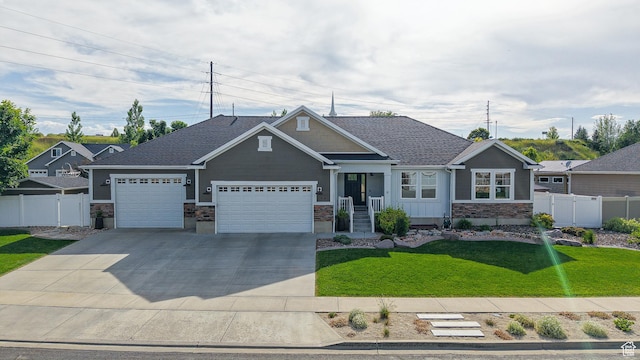 918 S River Ridge Lane, Spanish Fork, UT 84660 - craftsman inspired home featuring stone siding, an attached garage, and concrete driveway