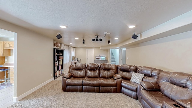 918 S River Ridge Lane, Spanish Fork, UT 84660 - home theater room featuring light carpet, recessed lighting, a textured ceiling, and baseboards