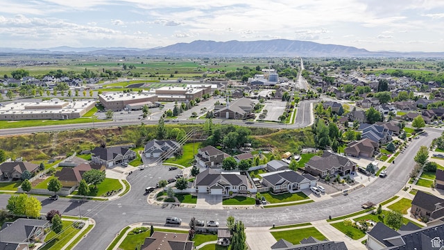 918 S River Ridge Lane, Spanish Fork, UT 84660 - aerial view of property and surrounding area featuring a mountainous background and nearby suburban area