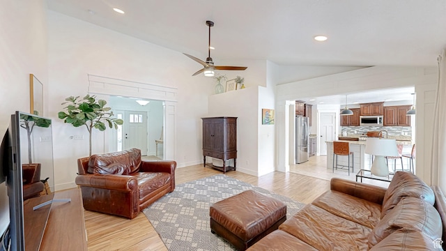 918 S River Ridge Lane, Spanish Fork, UT 84660 - living room with light wood-style floors, ceiling fan, baseboards, recessed lighting, and high vaulted ceiling