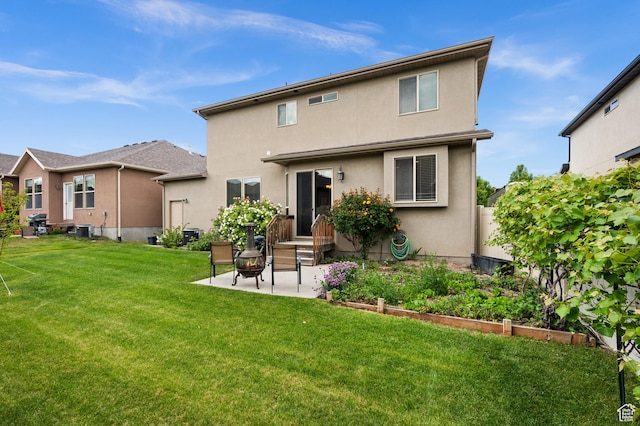 4117 W Shady Plum Way S, Jordan, UT 84009 - back of property with a patio area, stucco siding, cooling unit, a vegetable garden, and entry steps