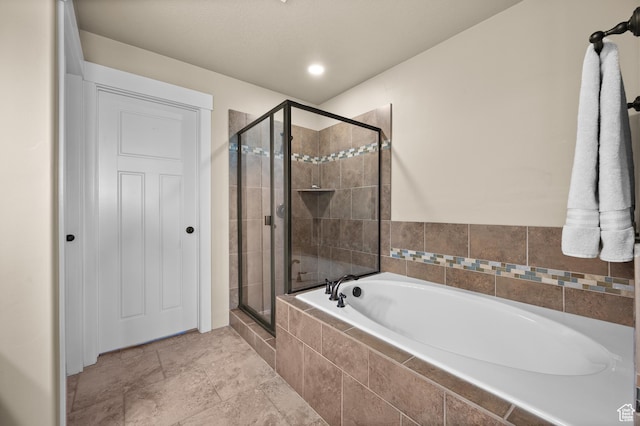 4117 W Shady Plum Way S, Jordan, UT 84009 - bathroom featuring a bath and a shower stall