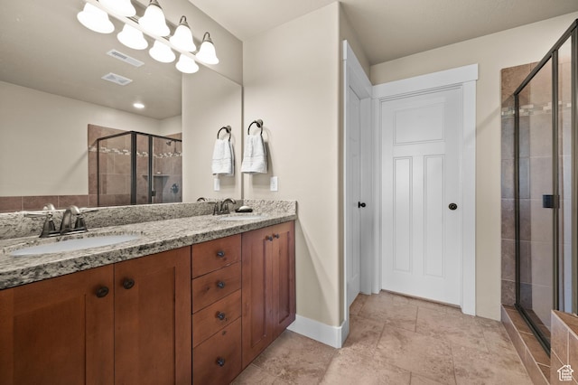 4117 W Shady Plum Way S, Jordan, UT 84009 - bathroom featuring a shower stall, double vanity, and baseboards