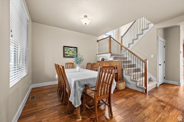 4117 W Shady Plum Way S, Jordan, UT 84009 - dining space with stairs, baseboards, and wood finished floors