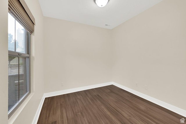 11379 S Oakmond Rd, South Jordan, UT 84009 - spare room featuring dark wood finished floors and baseboards