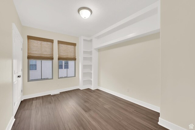 11379 S Oakmond Rd, South Jordan, UT 84009 - unfurnished room featuring dark wood-style floors and baseboards