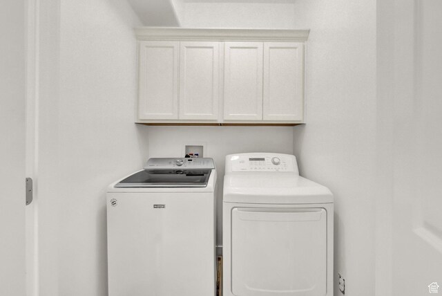 11379 S Oakmond Rd, South Jordan, UT 84009 - laundry area with washer and clothes dryer and cabinet space