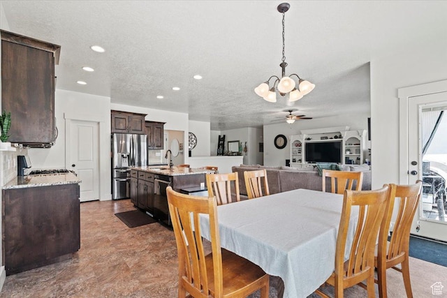 449 Travertine Way, Santaquin, UT 84655 - dining room featuring a chandelier, recessed lighting, ceiling fan, and a textured ceiling