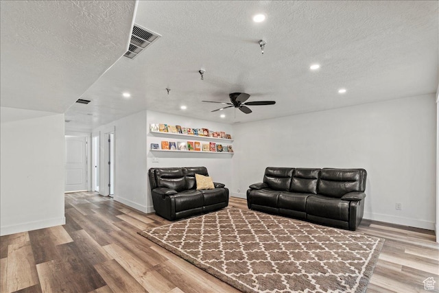 449 Travertine Way, Santaquin, UT 84655 - living area featuring a textured ceiling, recessed lighting, a ceiling fan, wood finished floors, and baseboards