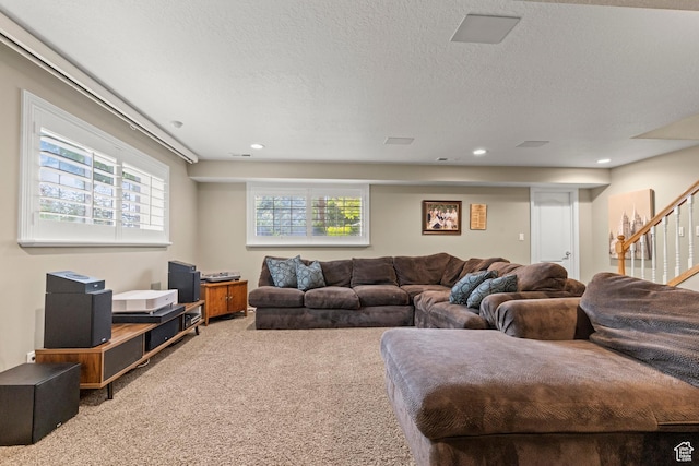 3330 N 175 W, North Ogden, UT 84414 - carpeted living area featuring stairs, a textured ceiling, and recessed lighting