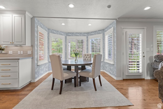3330 N 175 W, North Ogden, UT 84414 - dining area featuring plenty of natural light, baseboards, crown molding, recessed lighting, and a textured ceiling