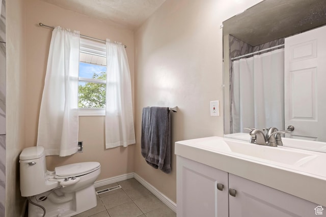 761 N Highland Blvd, Brigham City, UT 84302 - bathroom with toilet, vanity, tile patterned floors, and baseboards